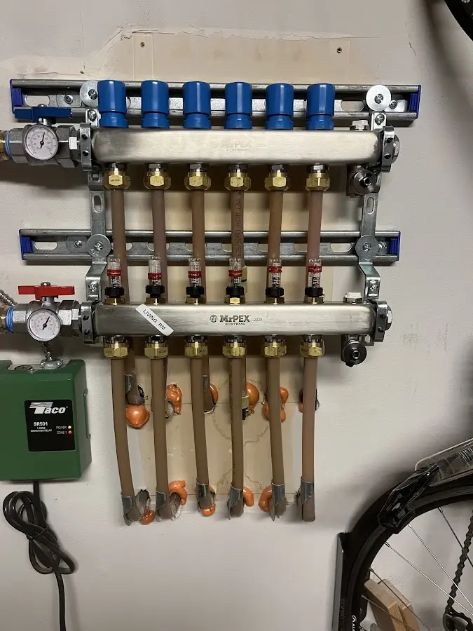 Plumber performing Water Heater Repair at a residential property in Clearfield